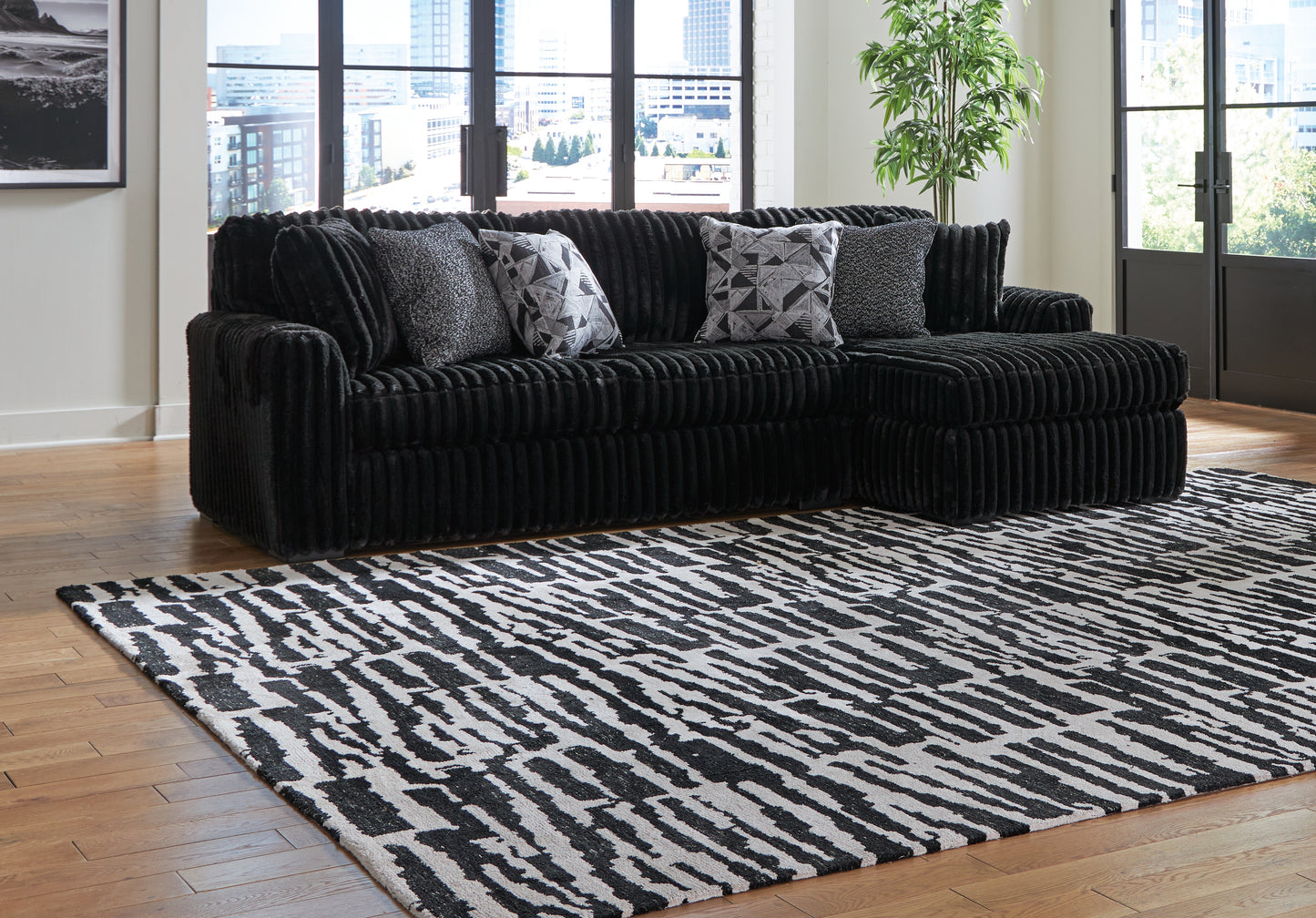Orange Furniture Outlet - Ashley Furniture - Midnight-Madness Sectional - LAF 2-Piece Sectional Sofa with Chaise / Onyx - 98103S2