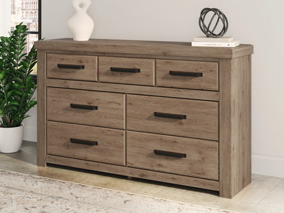 Orange Furniture Outlet - Ashley Furniture - Oliandon Bedroom - Seven Drawer Dresser / Light Brown - PCB2844-31