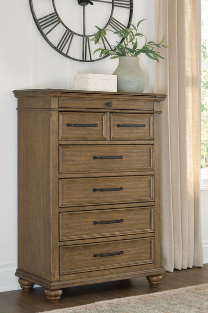Orange Furniture Outlet - Ashley Furniture - Karallin Bedroom - Seven Drawer Chest / Medium Brown - PCB782-46