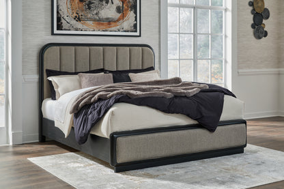 Orange Furniture Outlet - Ashley Furniture - Rowanbeck Bedroom - California King Upholstered Panel Bed / Gray/Black - B821B5