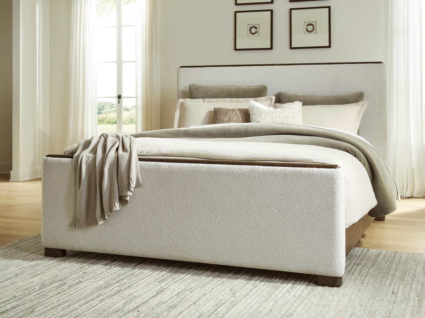 Orange Furniture Outlet - Ashley Furniture - Radkin Bedroom - Queen Upholstered Panel Bed / Burnished Brown - PCB843B2