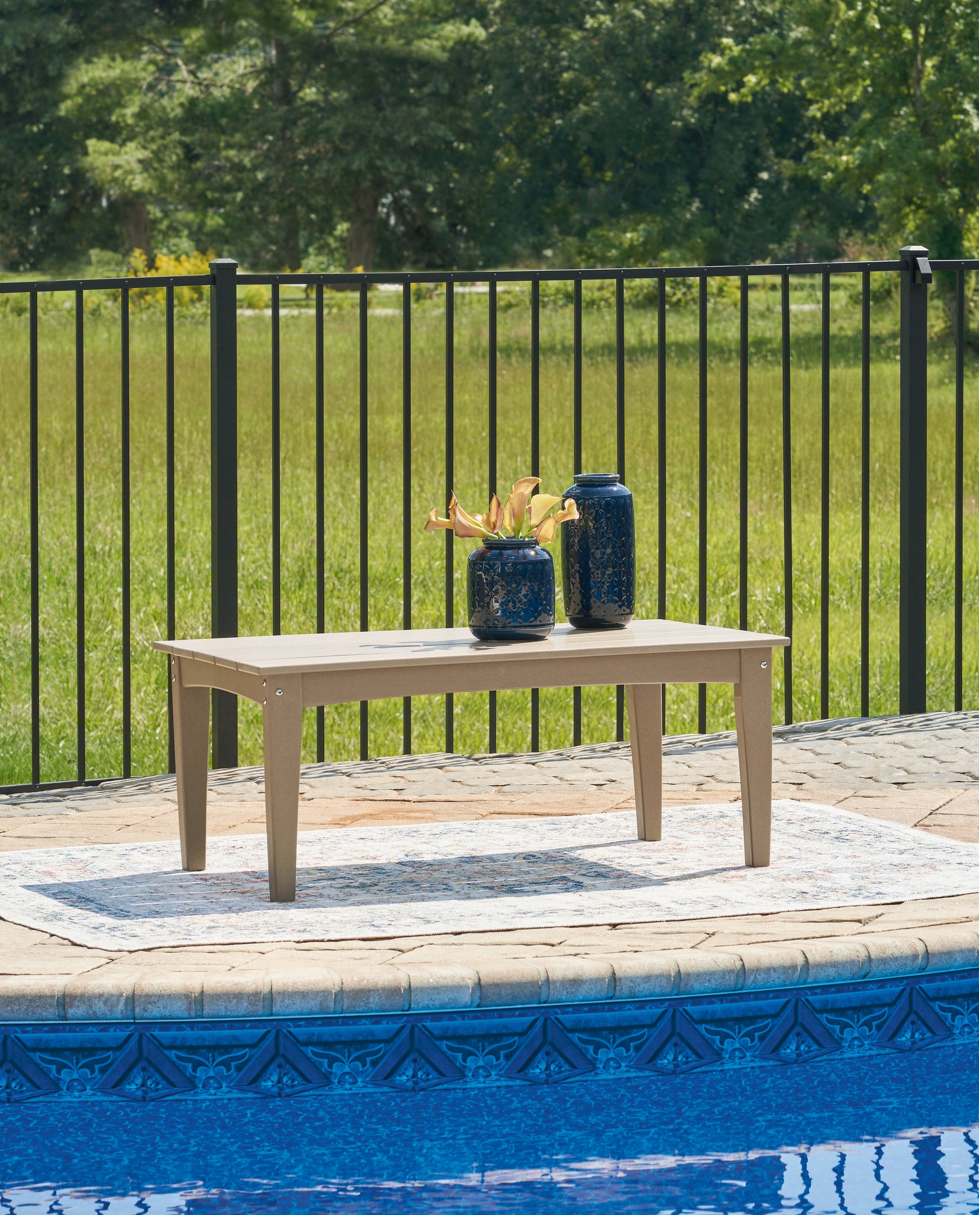 Orange Furniture Outlet - Ashley Furniture - Hyland wave Outdoor - Rectangular Cocktail Table / Driftwood - P114-701
