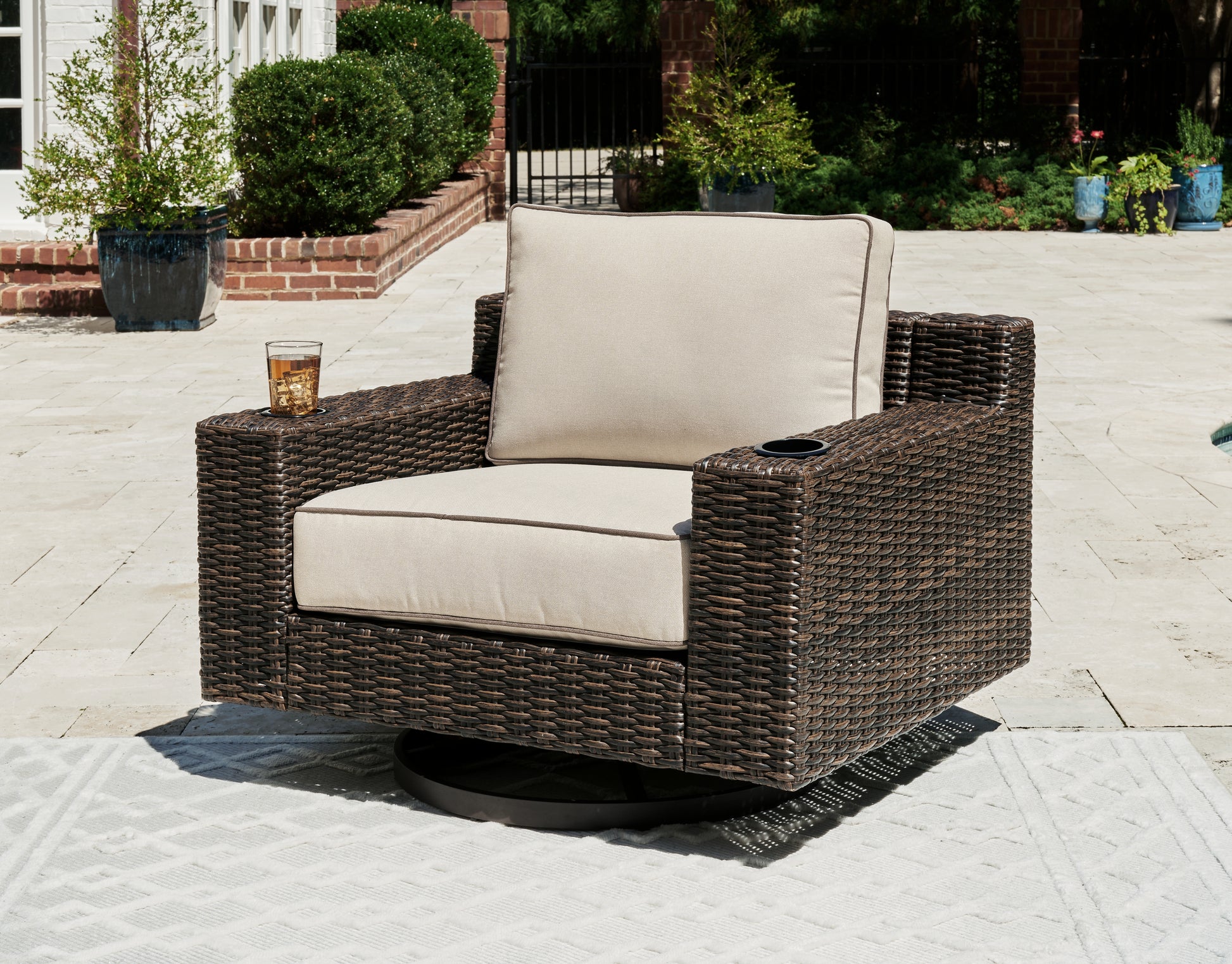 Orange Furniture Outlet - Ashley Furniture - Coastline Bay Outdoor - Swivel Lounge w/ Cushion / Brown - P784-821