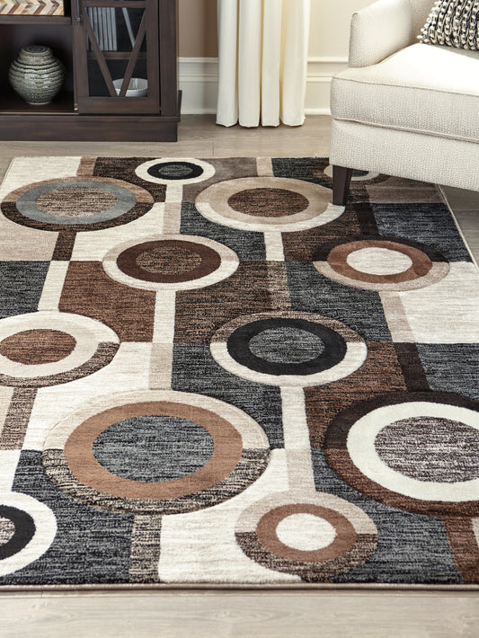 Orange Furniture Outlet - Ashley Furniture - Guintte Rug - 5' x 6'7" Rug / Multi - R403972