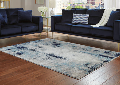 Orange Furniture Outlet - Ashley Furniture - Leonelle Rug - 7'10" x 10' Rug / White/Blue/Gray - R404871