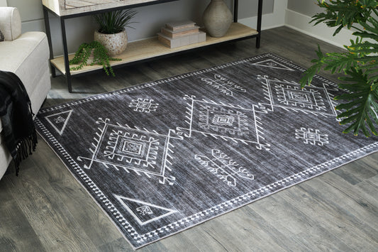 Orange Furniture Outlet - Ashley Furniture - Arloman Rug - 5' x 7' Washable Rug / Black/Cream/Gray - R405932