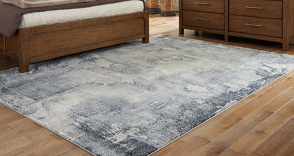 Orange Furniture Outlet - Ashley Furniture - Langrich Rug - 7'10" x 10'6" Rug / Blue/Gray/Cream - R406131