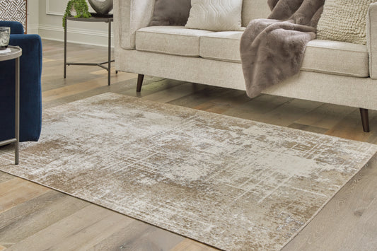 Orange Furniture Outlet - Ashley Furniture - Grifflain Rug - 5'1" x 7' Washable Rug / Tan/Brown/Gray - R406232