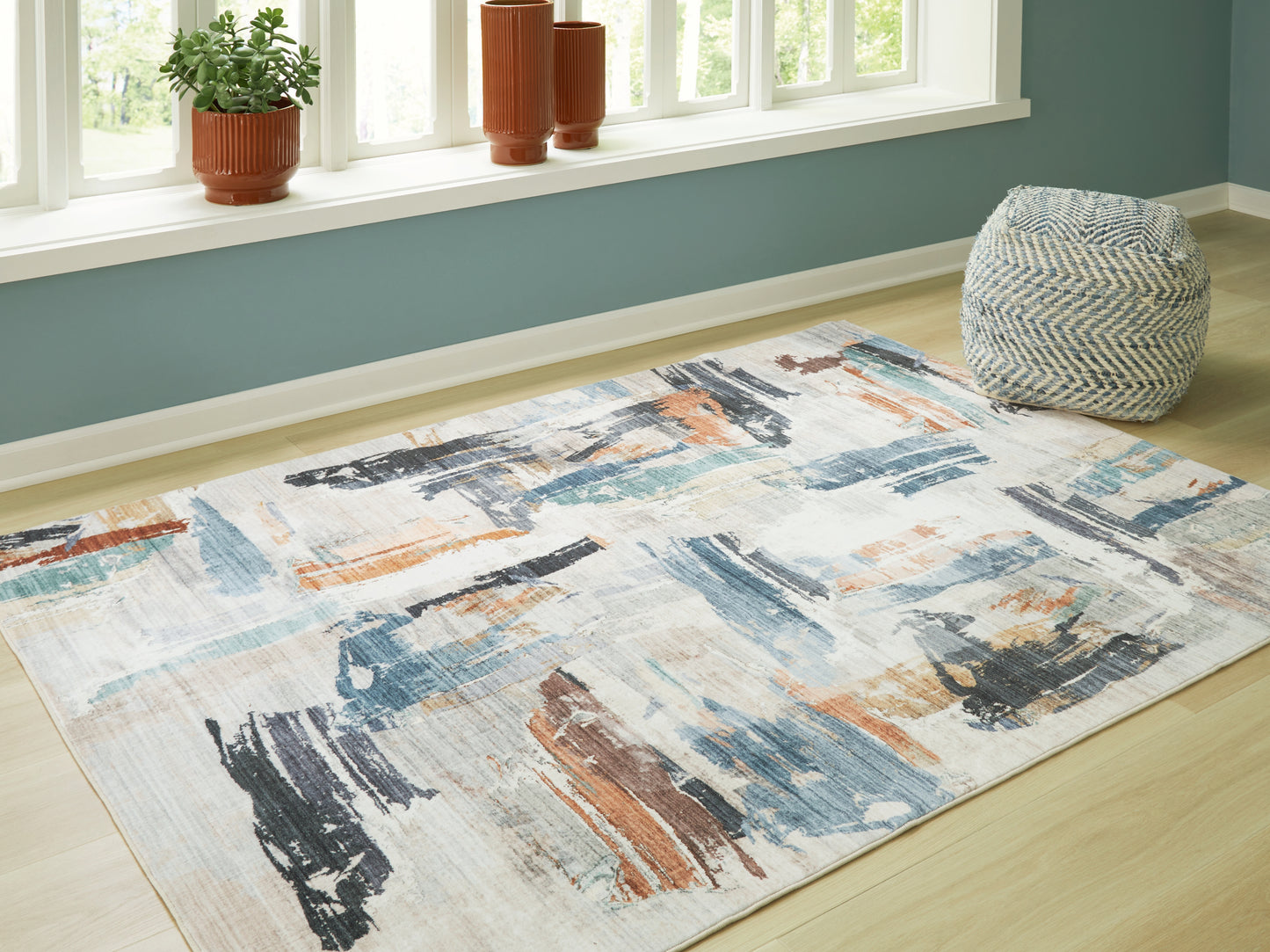 Orange Furniture Outlet - Ashley Furniture - Hessland Rug - 8' x 10' Washable Rug / Multi - R407051