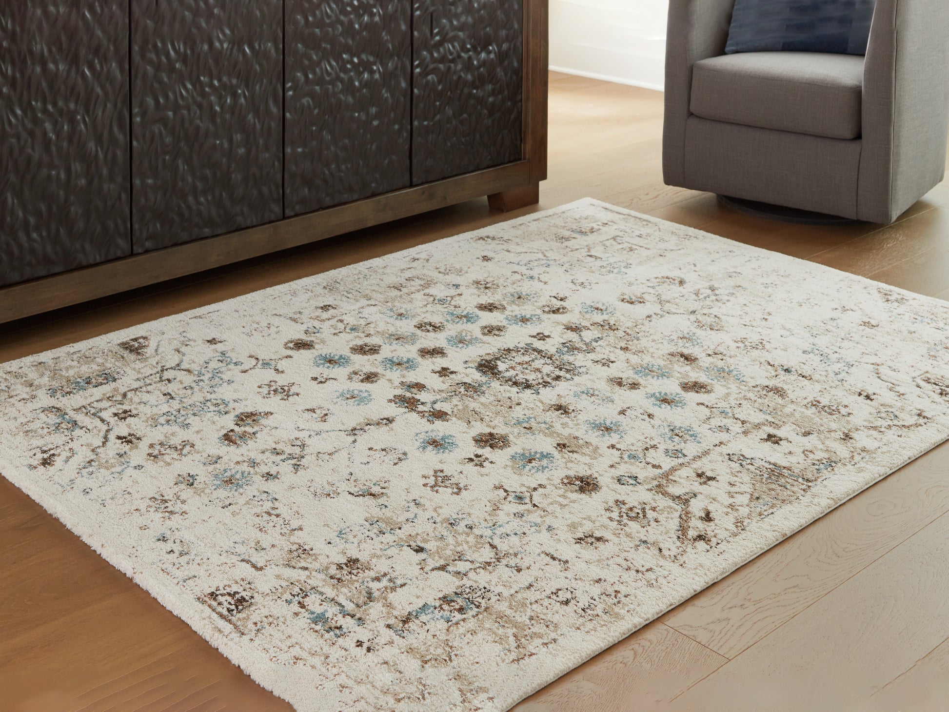 Orange Furniture Outlet - Ashley Furniture - Jossler Rug - 8' x 10' Rug / Ivory/Brown/Teal - R407071