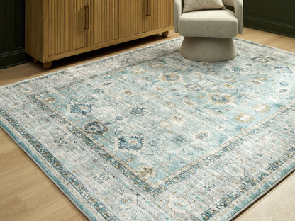 Orange Furniture Outlet - Ashley Furniture - Ladstoney Rug - 7'6" x 9'6" Area Rug / Teal/Beige/Ochre - R407501