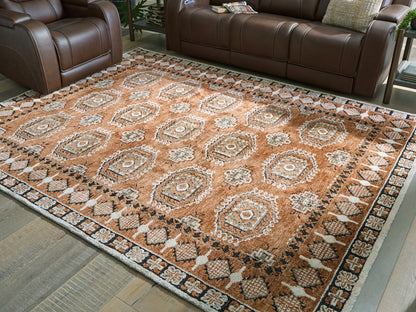 Orange Furniture Outlet - Ashley Furniture - Qaabiz Rug - 5' x 7' Area Rug / Sienna/Ivory/Black - R407522
