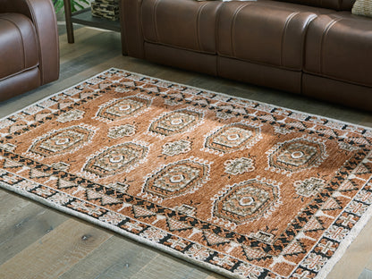 Orange Furniture Outlet - Ashley Furniture - Qaabiz Rug - 5' x 7' Area Rug / Sienna/Ivory/Black - R407522