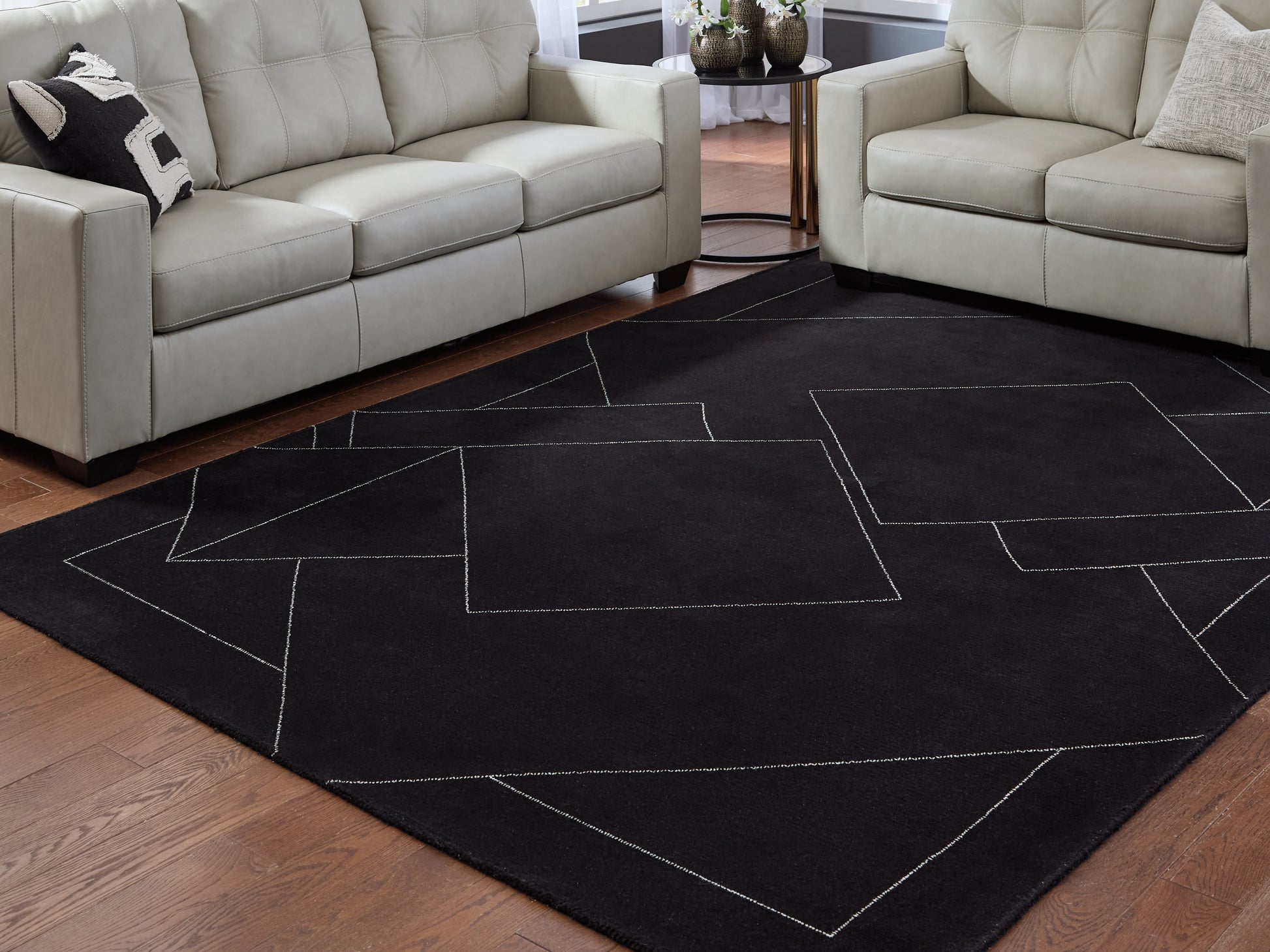 Orange Furniture Outlet - Ashley Furniture - Marav Rug - 7'8" x 10' Area Rug / Black/White - R407531
