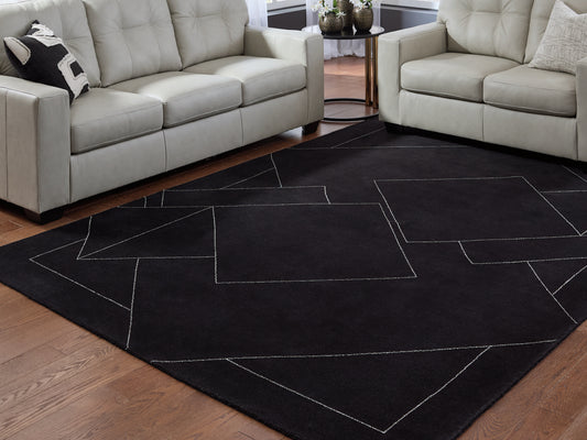 Orange Furniture Outlet - Ashley Furniture - Marav Rug - 7'8" x 10' Area Rug / Black/White - R407531