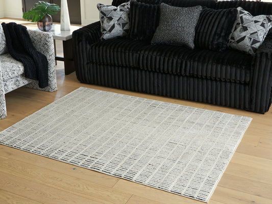 Orange Furniture Outlet - Ashley Furniture - Turinwith Rug - 5'3" x 7' Area Rug / Ivory/Black - R407552