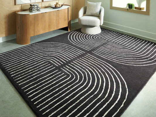 Orange Furniture Outlet - Ashley Furniture - Eldonmore Rug - 5' x 7' Area Rug / Black/Ivory - R407572