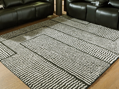 Orange Furniture Outlet - Ashley Furniture - Kurtmen Rug - 7'10" x 9'10" Area Rug / Black/Ivory - R407591