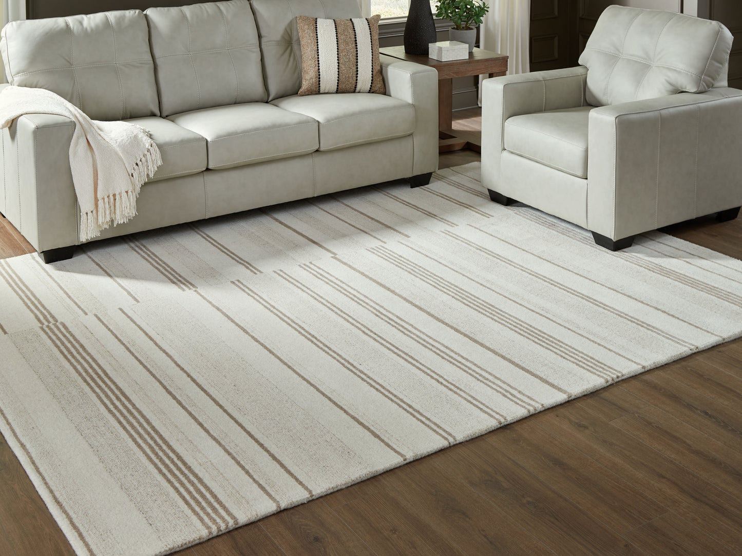 Orange Furniture Outlet - Ashley Furniture - Gadence Rug - 5' x 7' Area Rug / Ivory/Tan - R407642