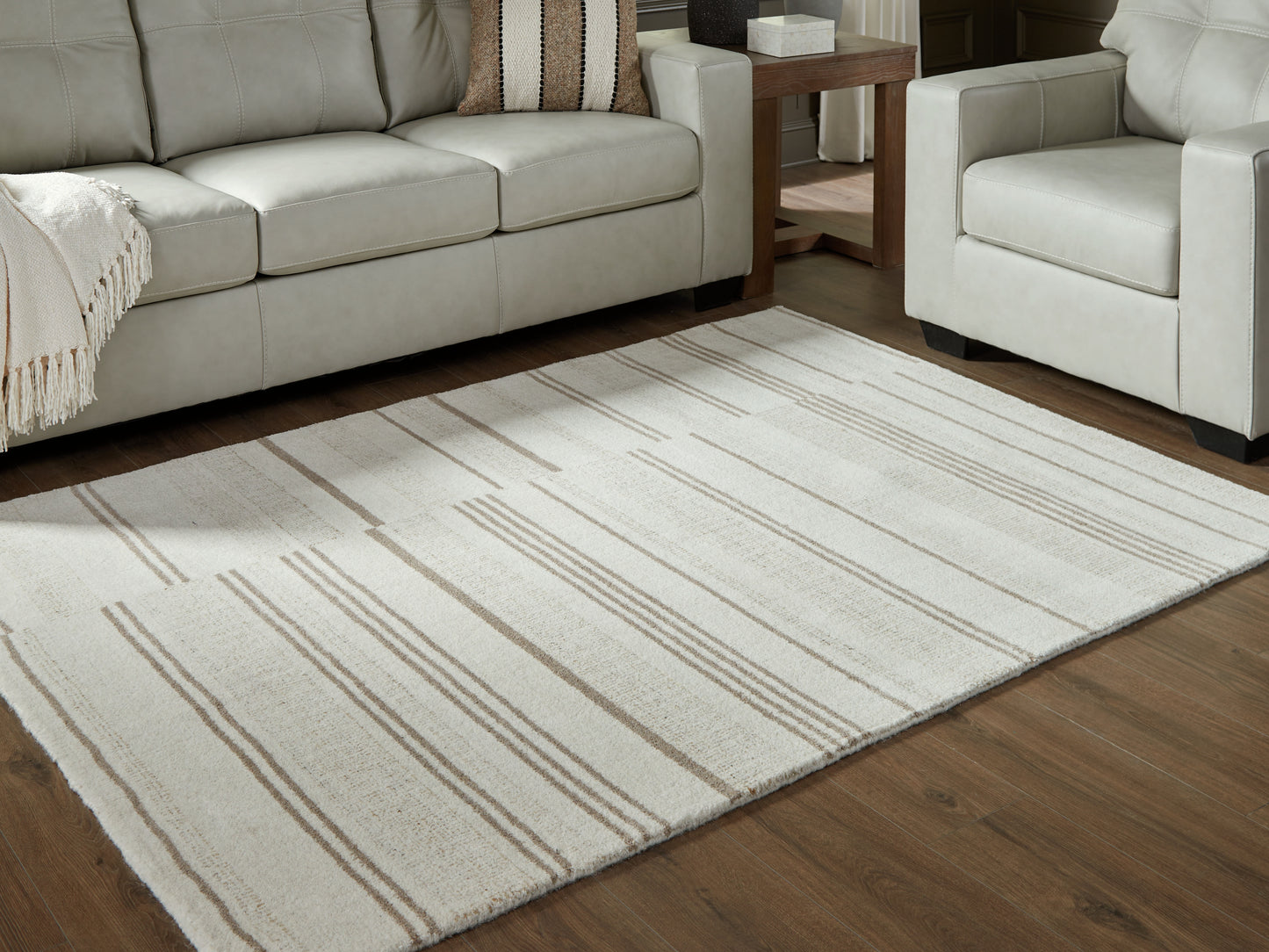 Orange Furniture Outlet - Ashley Furniture - Gadence Rug - 5' x 7' Area Rug / Ivory/Tan - R407642