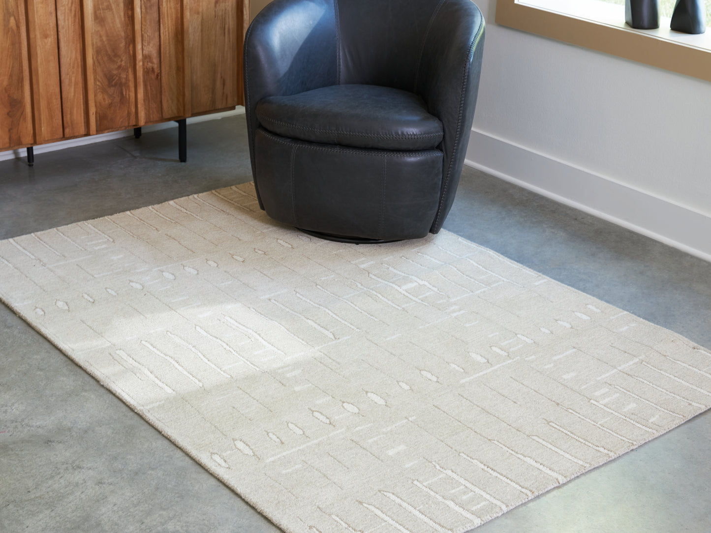 Orange Furniture Outlet - Ashley Furniture - Wolbert Rug - 5' x 7' Area Rug / Tan/Ivory - R407662