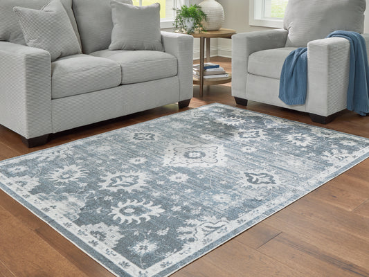 Orange Furniture Outlet - Ashley Furniture - Avanworths Rug - Washable 7'10" x 10' Area Rug / Blue/Gray/Ivory - R407791