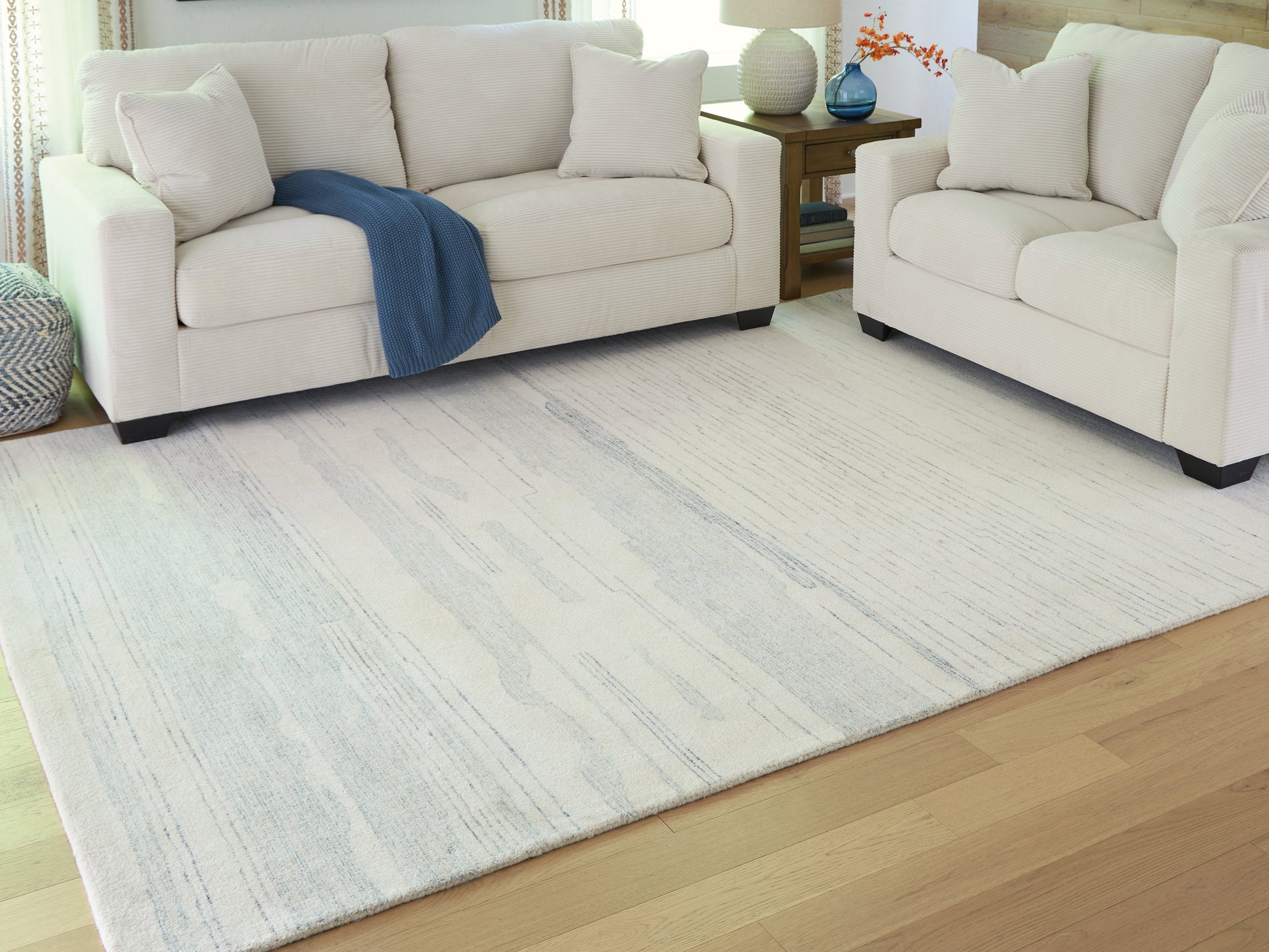 Orange Furniture Outlet - Ashley Furniture - Genemost Rug - 7'8" x 10' Area Rug / Ivory/Blue - R407841