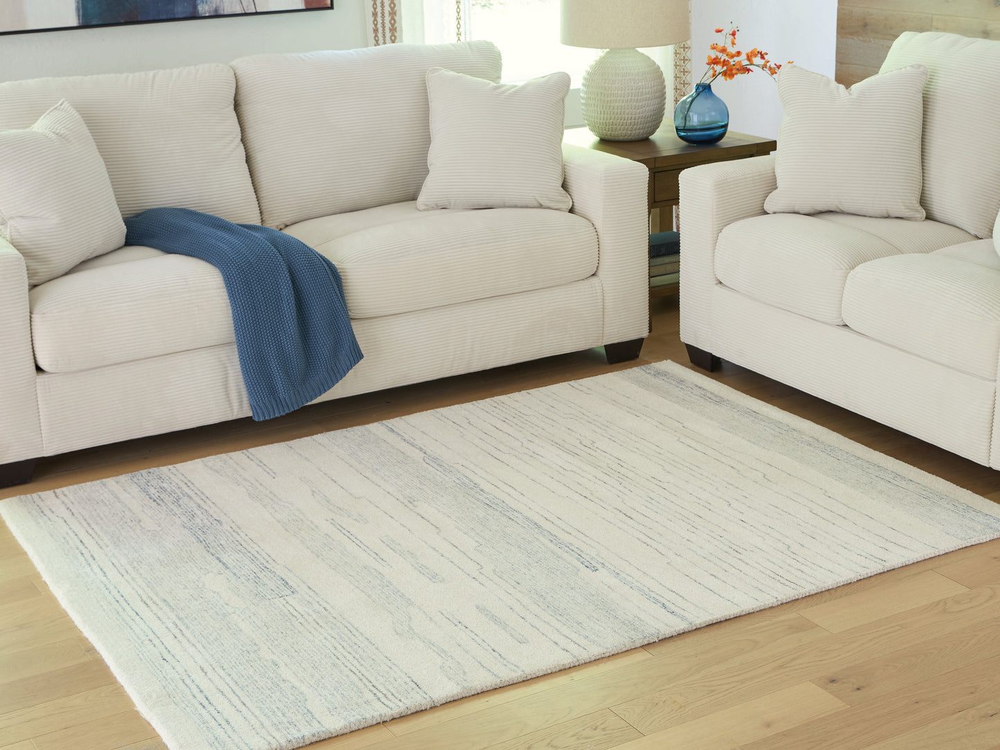 Orange Furniture Outlet - Ashley Furniture - Genemost Rug - 5' x 7' Area Rug / Ivory/Blue - R407842