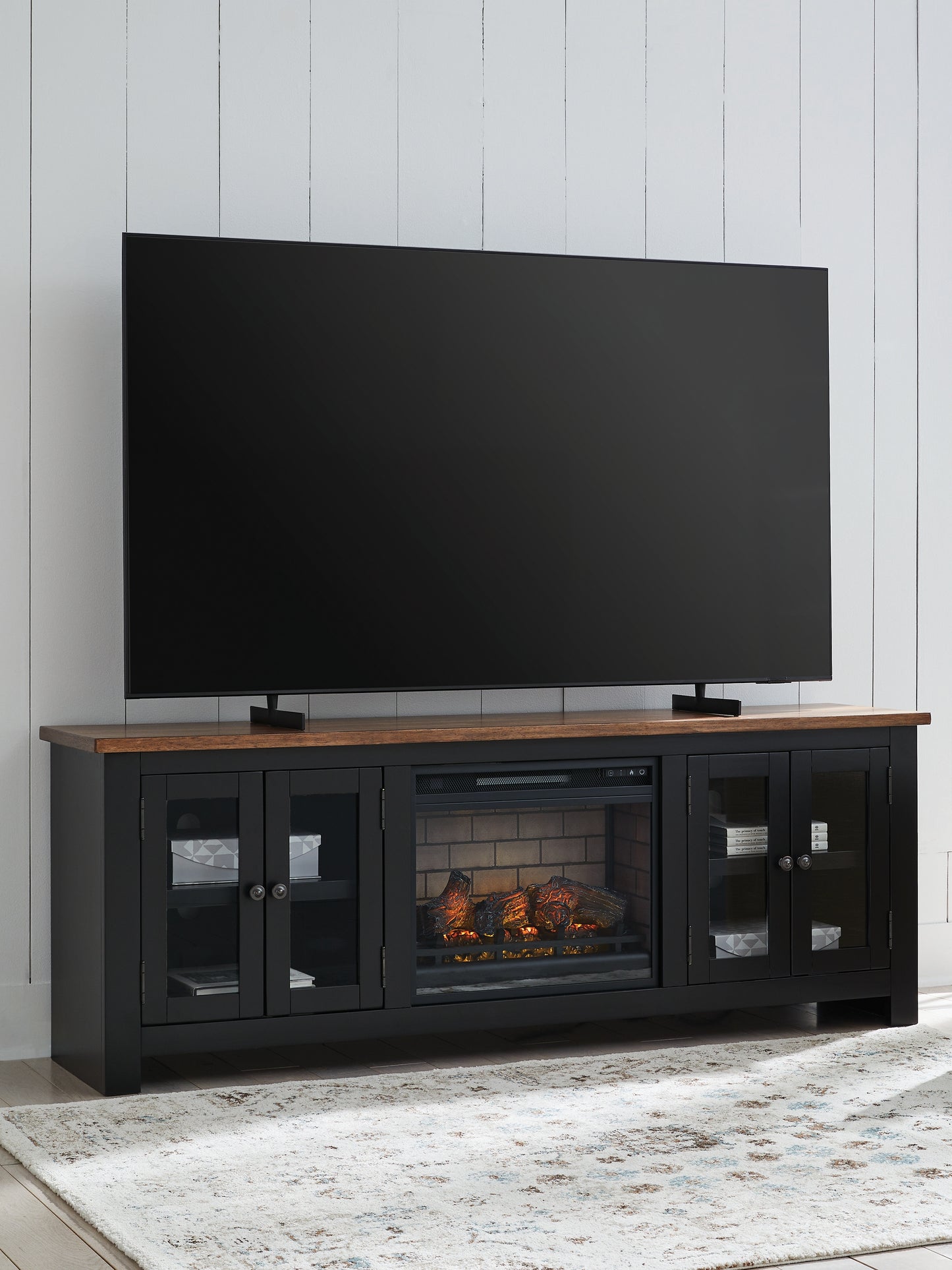 Orange Furniture Outlet - Ashley Furniture - Wildenauer 76" TV Stand with Electric Fireplace - 76" TV Stand with Electric Fireplace / Brown/Black - W664W1